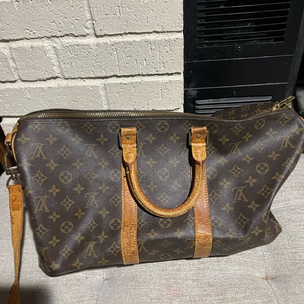 Vintage Louis Vuitton duffle bag (poor condition)